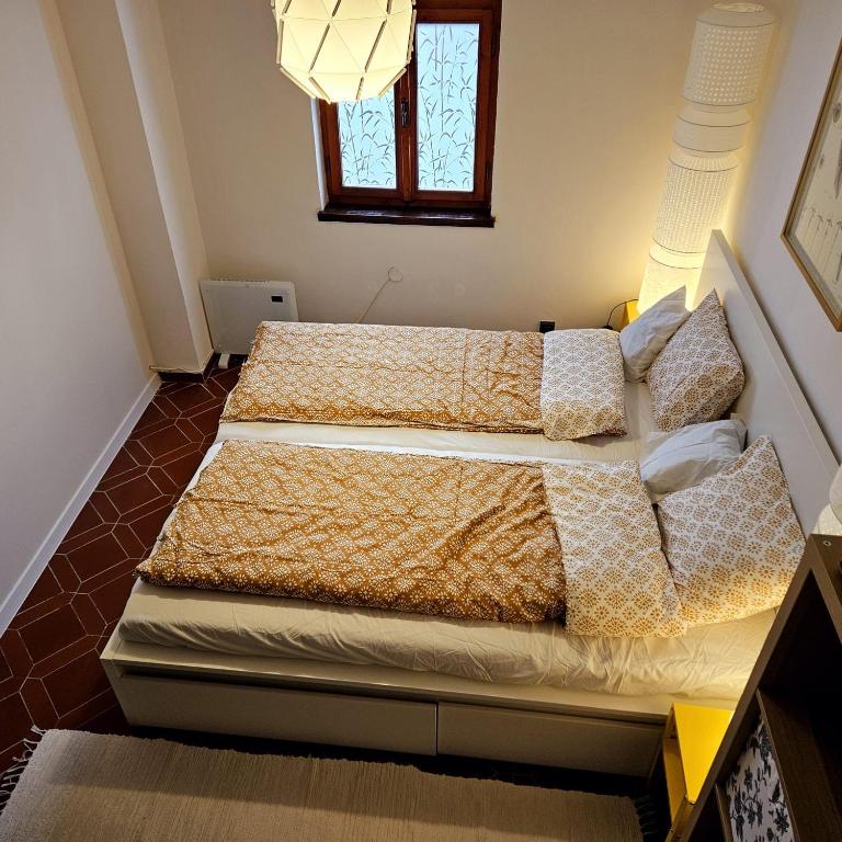 Postel nebo postele na pokoji v ubytování Apartment Salamander