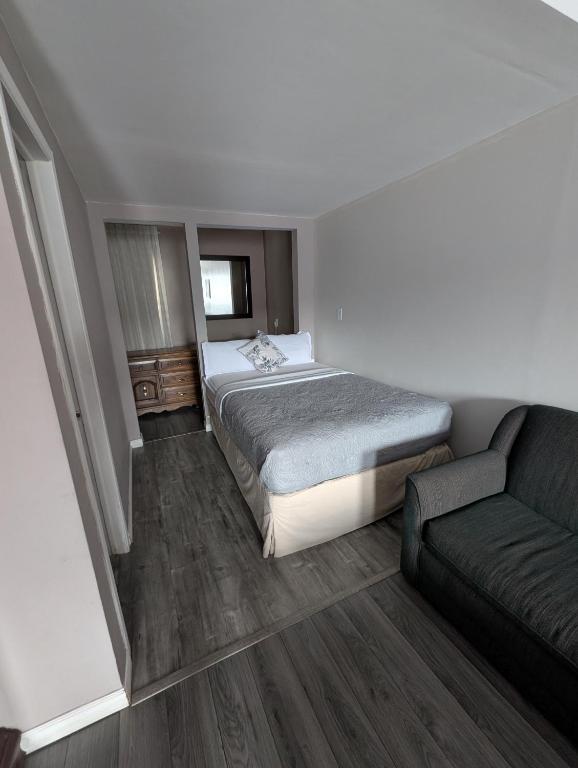 Postel nebo postele na pokoji v ubytování 7 Nights Stay