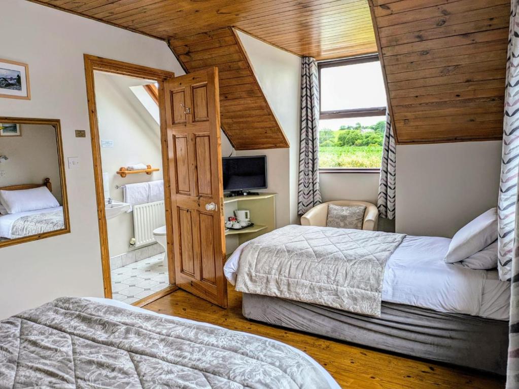 Postel nebo postele na pokoji v ubytování Melrose Bed and Breakfast