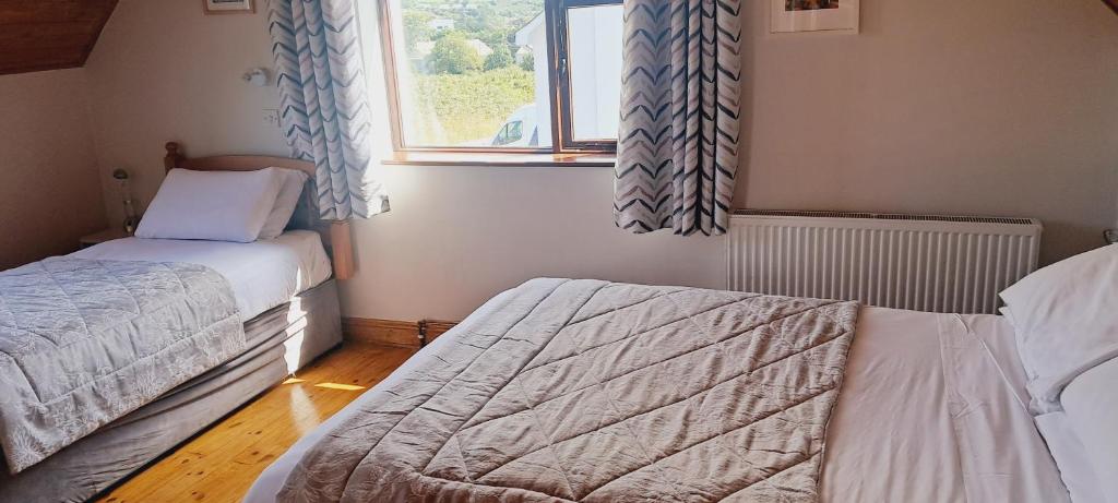 Postel nebo postele na pokoji v ubytování Melrose Bed and Breakfast