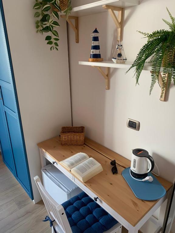 Příslušenství pro přípravu čaje a kávy v ubytování B&B Casa Prencipe