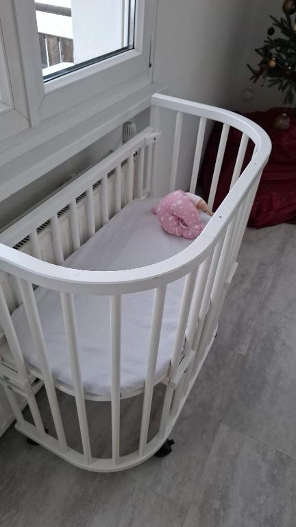 Postel nebo postele na pokoji v ubytování Zimmer mit Herz