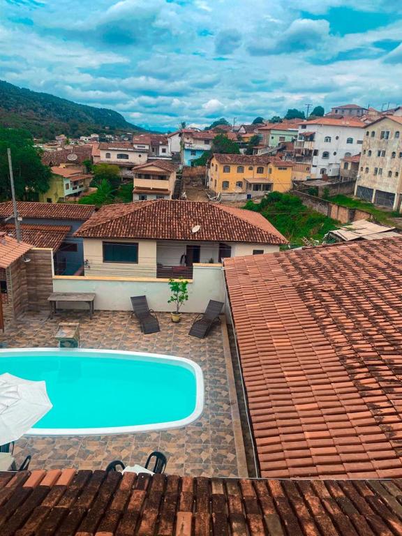 a swimming pool on the roof of a house at Pousada Sinhá Moça in Diamantina