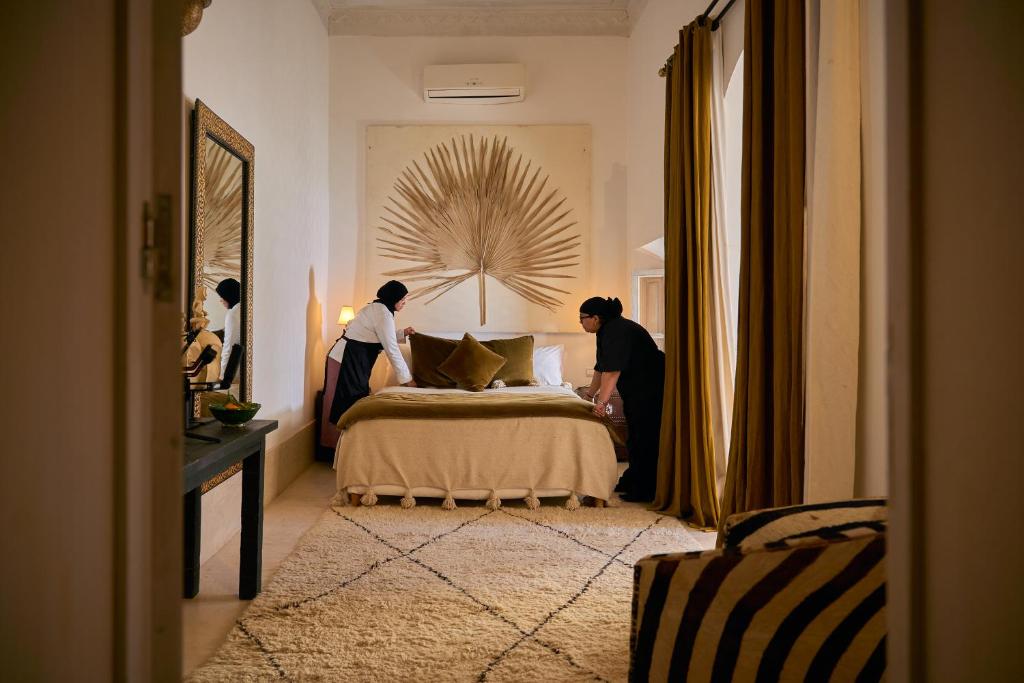 Postel nebo postele na pokoji v ubytování Riad Nomada Marrakech
