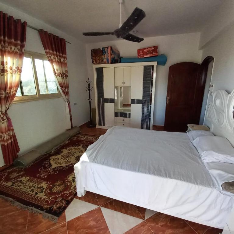 Postel nebo postele na pokoji v ubytování Banana Guest House
