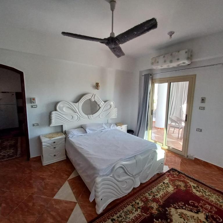 Postel nebo postele na pokoji v ubytování Banana Guest House
