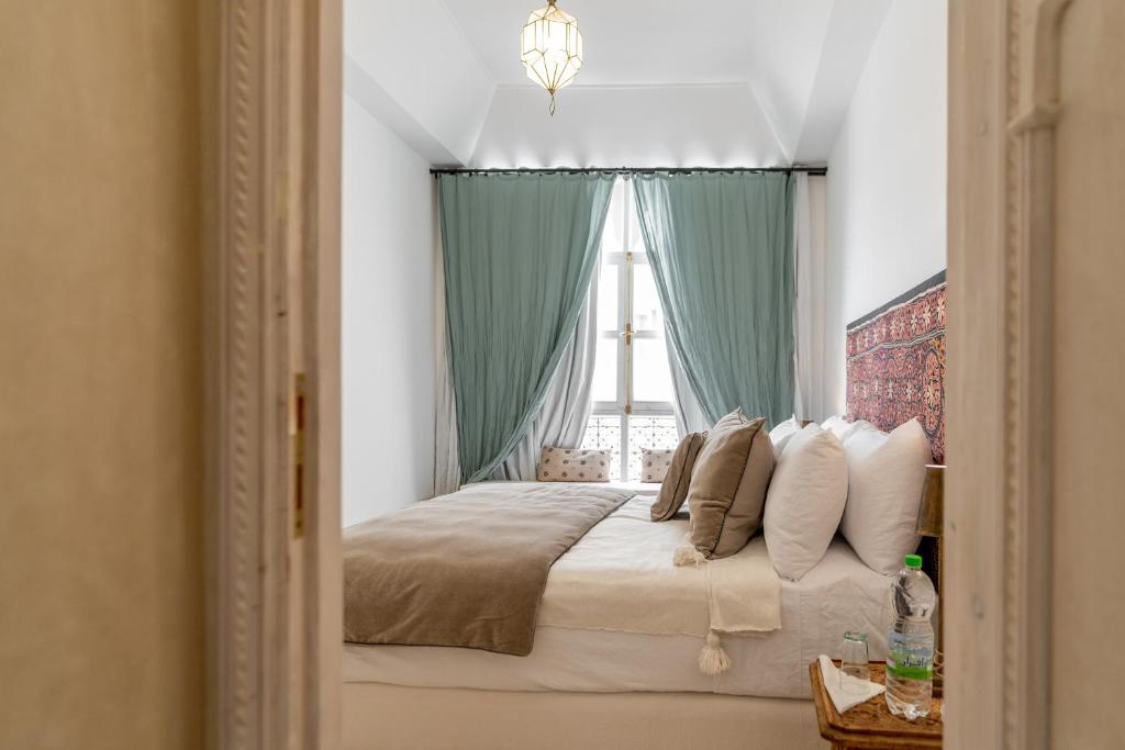 Postel nebo postele na pokoji v ubytování Riad Nomada Marrakech
