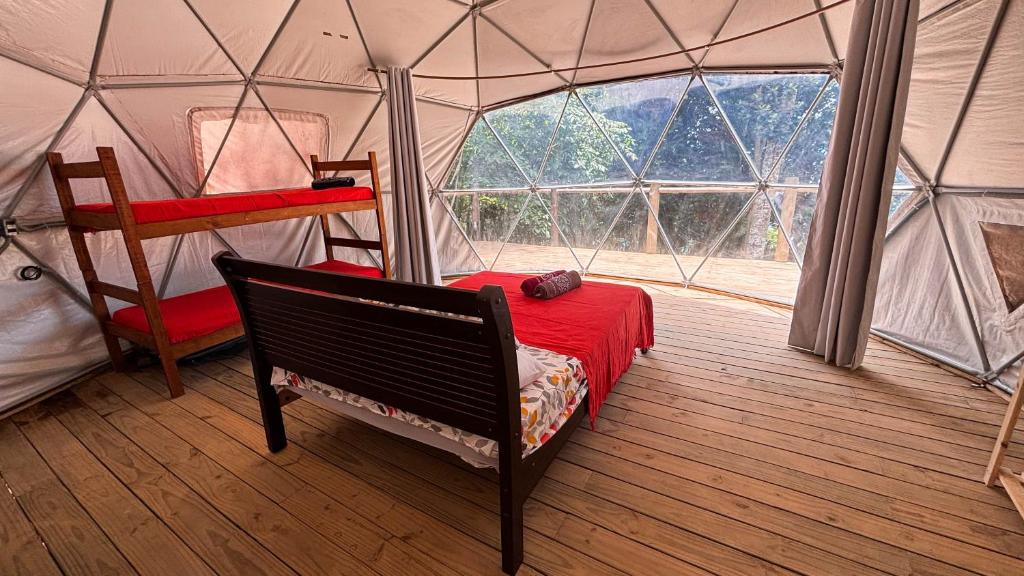Voodi või voodid majutusasutuse Glamping Sitio das Tartarugas toas
