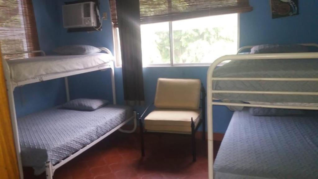 Postel nebo postele na pokoji v ubytování Casa Azul