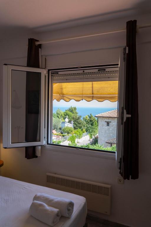 Postel nebo postele na pokoji v ubytování Cookoo Villas