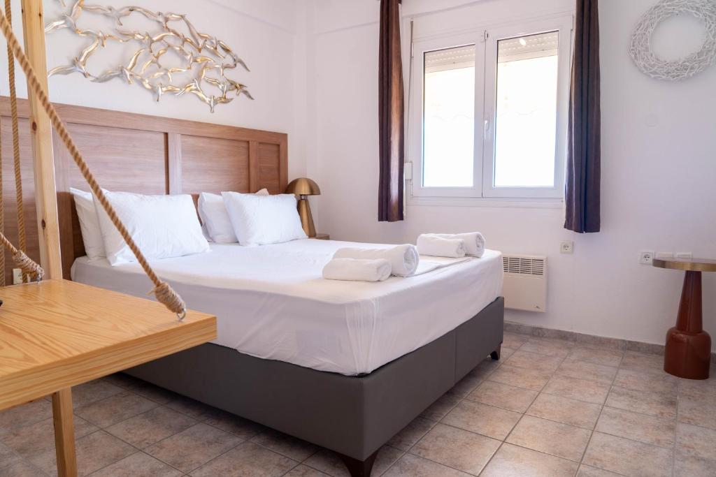Postel nebo postele na pokoji v ubytování Cookoo Villas