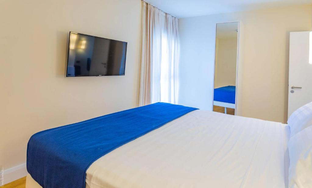 Postel nebo postele na pokoji v ubytování Panorama sea view Central Hotel
