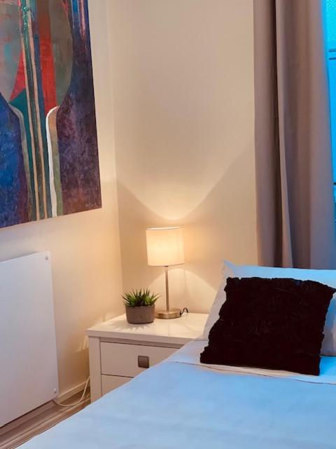 Voodi või voodid majutusasutuse CitiRooms Auckland toas