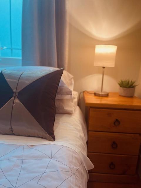 Voodi või voodid majutusasutuse CitiRooms Auckland toas