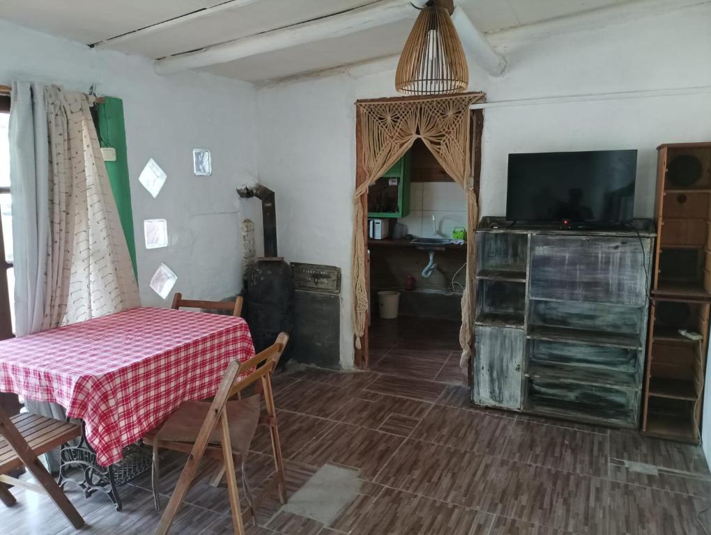 TV a/nebo společenská místnost v ubytování Casas Punta Negra