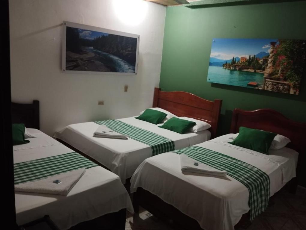 Postel nebo postele na pokoji v ubytování Hotel Sol y Mar