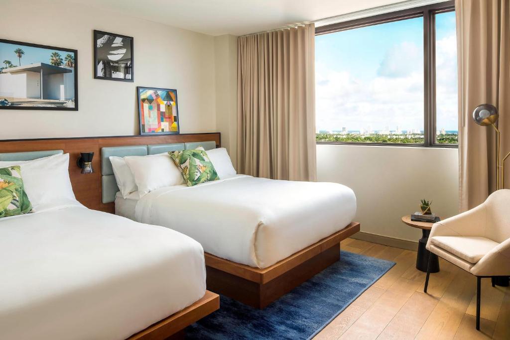 Postel nebo postele na pokoji v ubytování The Dalmar, Fort Lauderdale, a Tribute Portfolio Hotel