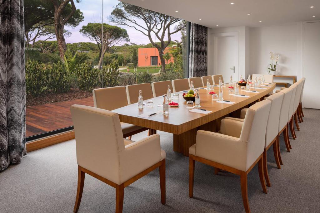 a conference room with a long table and chairs at Sheraton Cascais Resort - Hotel & Residences in Cascais