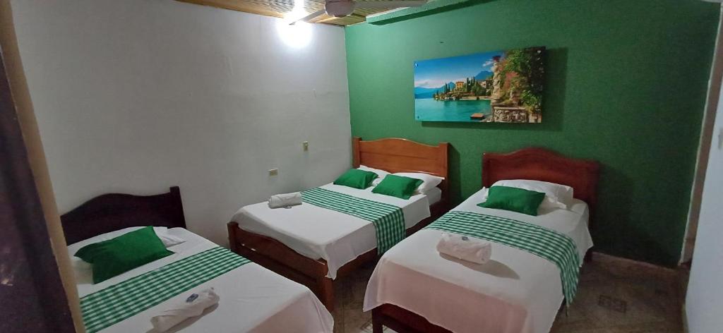 Postel nebo postele na pokoji v ubytování Hotel Sol y Mar