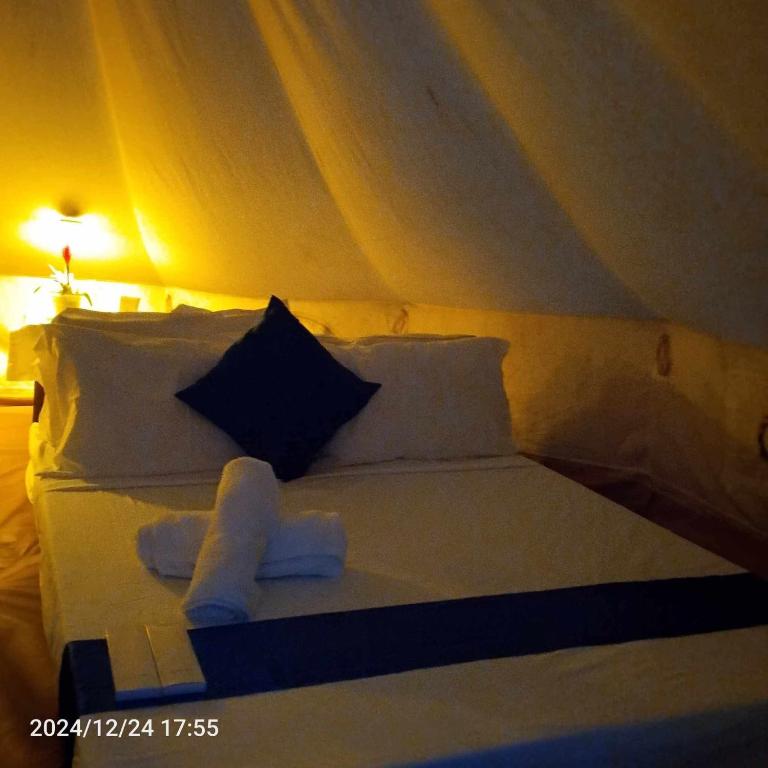Postel nebo postele na pokoji v ubytování Puerto Silanguin Beach Resort and Cafe