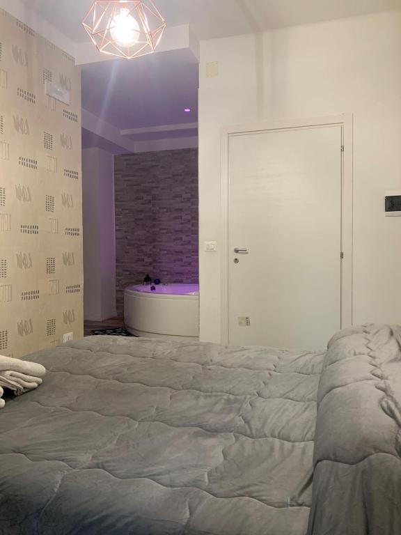 Posteľ alebo postele v izbe v ubytovaní B&B LE COCCINELLE