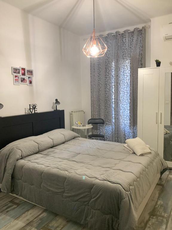 Posteľ alebo postele v izbe v ubytovaní B&B LE COCCINELLE