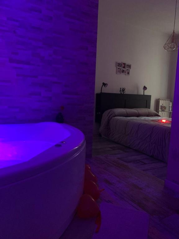 Posteľ alebo postele v izbe v ubytovaní B&B LE COCCINELLE