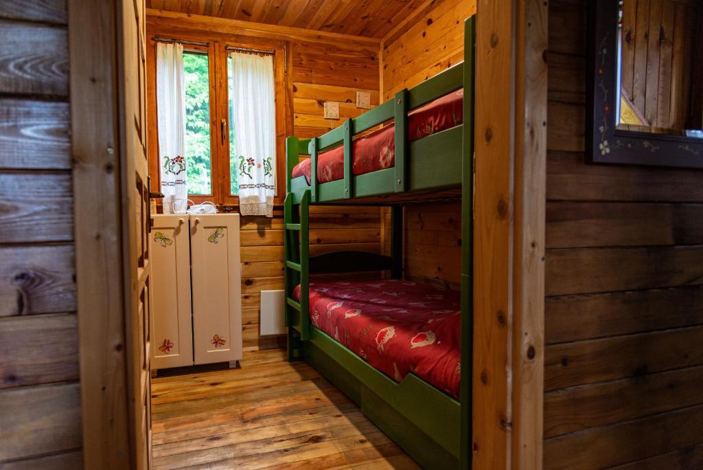 Postel nebo postele na pokoji v ubytování Drvene kuće ŠUŠKA - Wooden Houses SUSKA