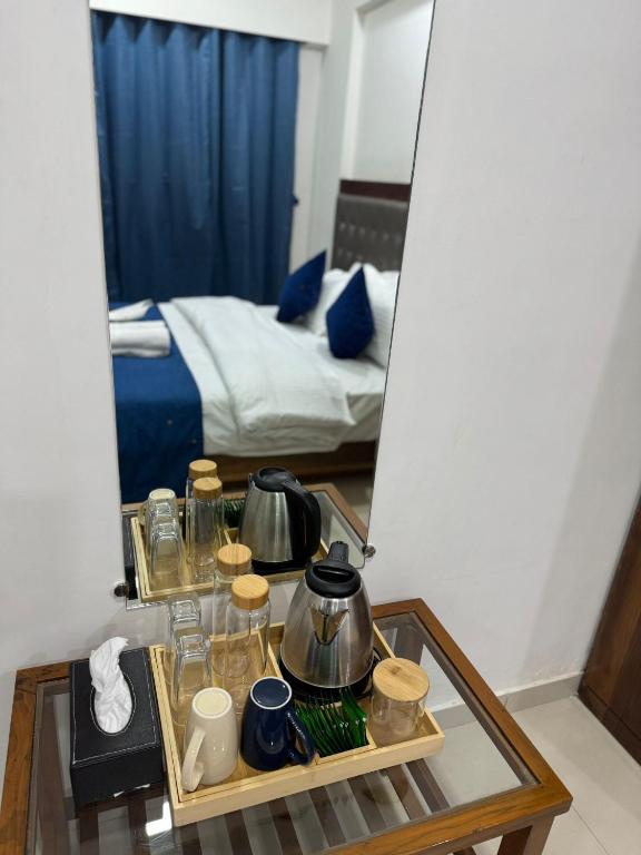Postel nebo postele na pokoji v ubytování Luna Spaces- Near Mumbai International Airport