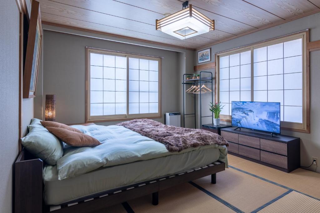 TV a/nebo společenská místnost v ubytování Welcome Nozawa