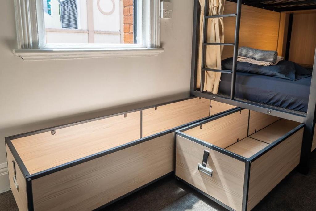 Postel nebo postele na pokoji v ubytování Tequila Sunrise Podstel