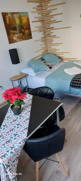 Postel nebo postele na pokoji v ubytování Refugiu Alpin Borsec