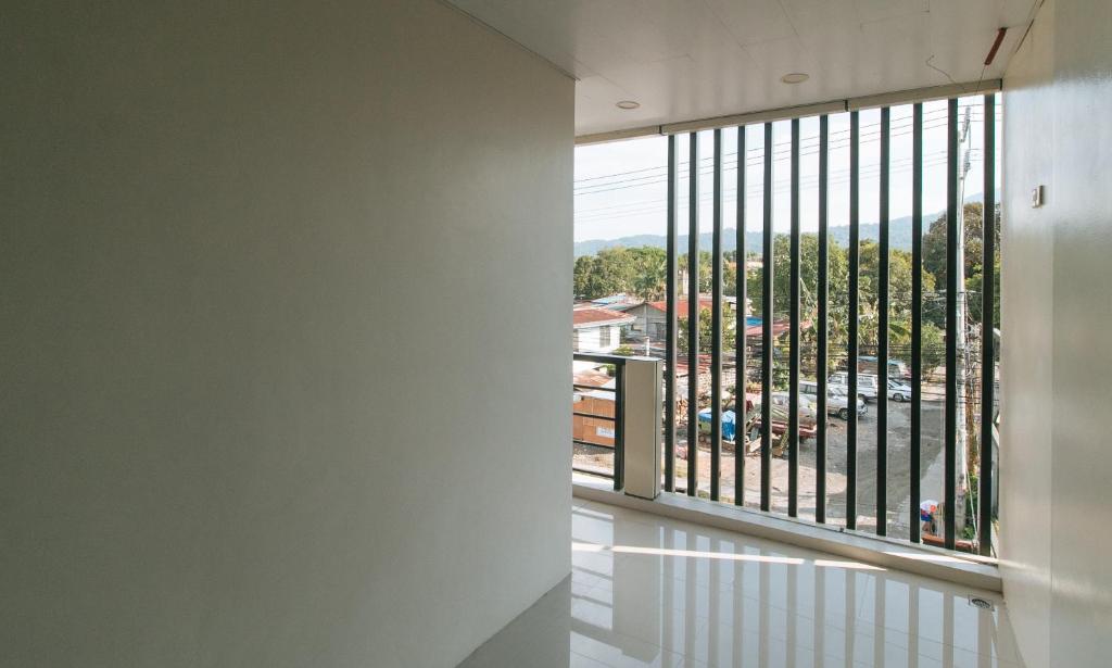 Fotografie z fotogalerie ubytování RedDoorz @ Aerial Hotel Los Baños v destinaci Los Banos