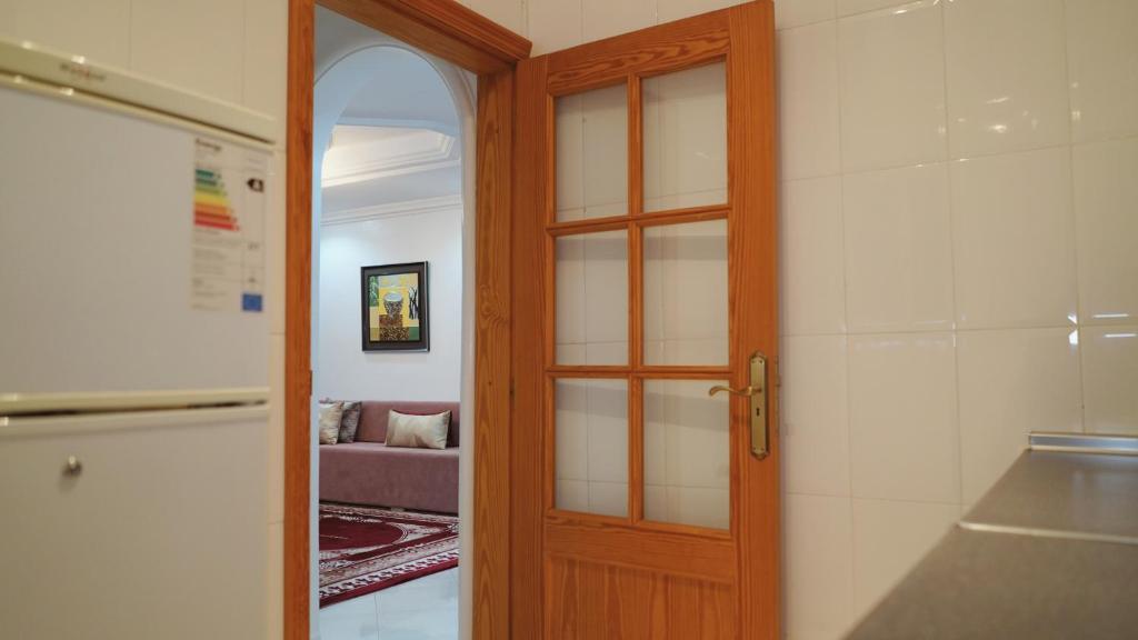 Postel nebo postele na pokoji v ubytování Hôtel Prestige