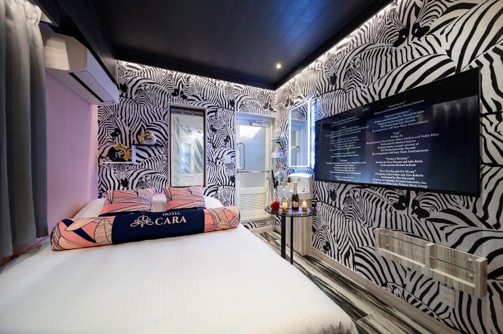 Postel nebo postele na pokoji v ubytování Hotel CARA 大人専用Adult only hotel