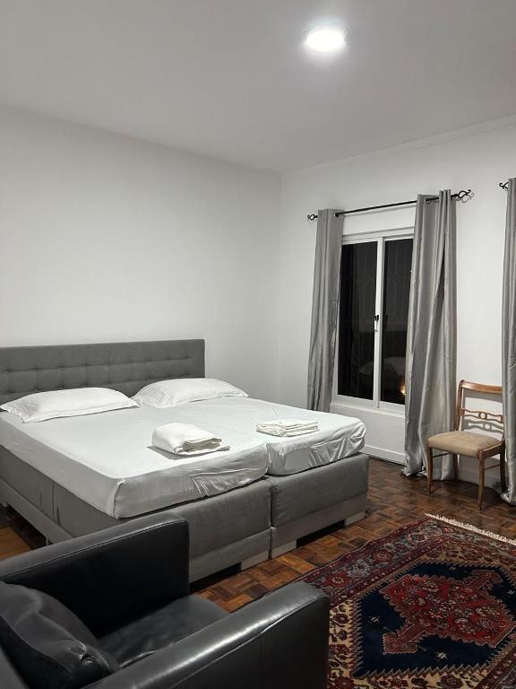 Postel nebo postele na pokoji v ubytování Casa Estrela - Sea & Art Guesthouse
