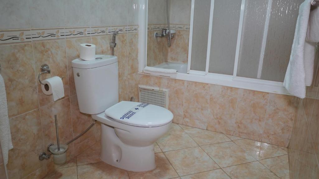 Koupelna v ubytování Hôtel Prestige