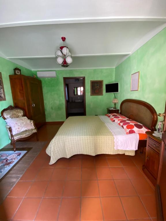 Ένα ή περισσότερα κρεβάτια σε δωμάτιο στο La Cassina Room