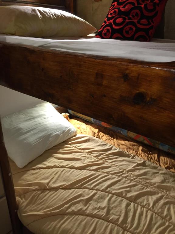 Postel nebo postele na pokoji v ubytování Gerani