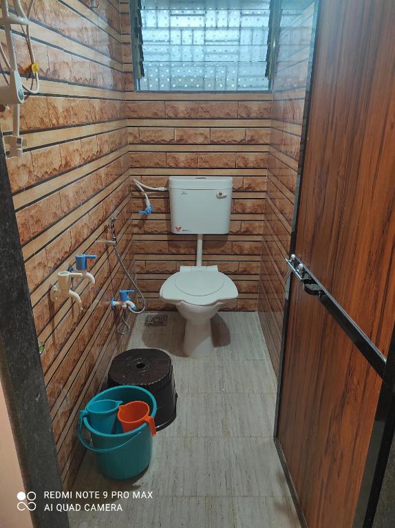 Koupelna v ubytování Swanand Home Stay
