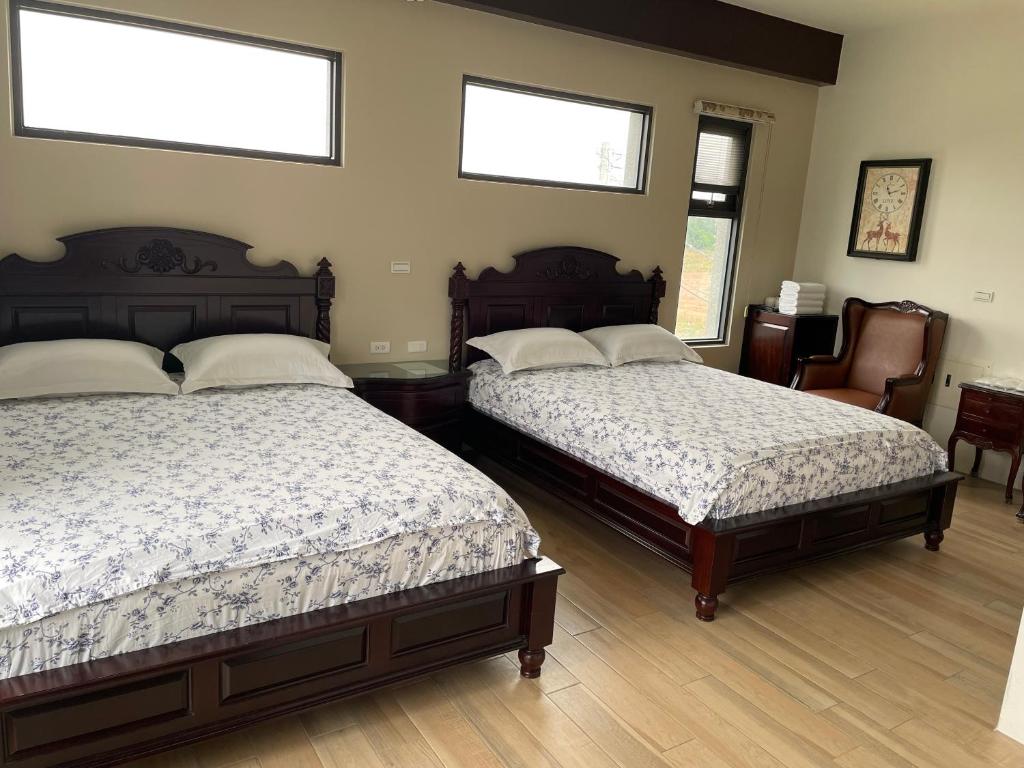 Postel nebo postele na pokoji v ubytování 出門獺踏 Otter footprints B&B
