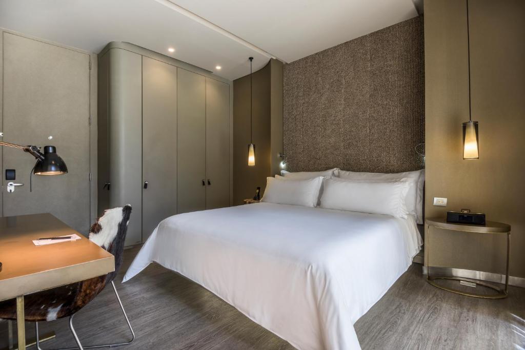 Postel nebo postele na pokoji v ubytování BOG Hotel
