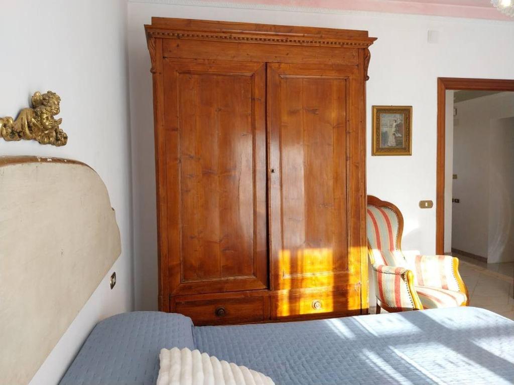 Posteľ alebo postele v izbe v ubytovaní Toscana Grande Appartamento in Villa con 2 camere, terrazze, giardino e posto auto privato Tutti spazi uso esclusivo