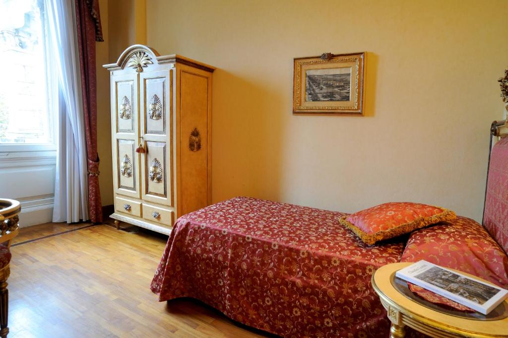 Postel nebo postele na pokoji v ubytování Park Hotel Villa Ariston