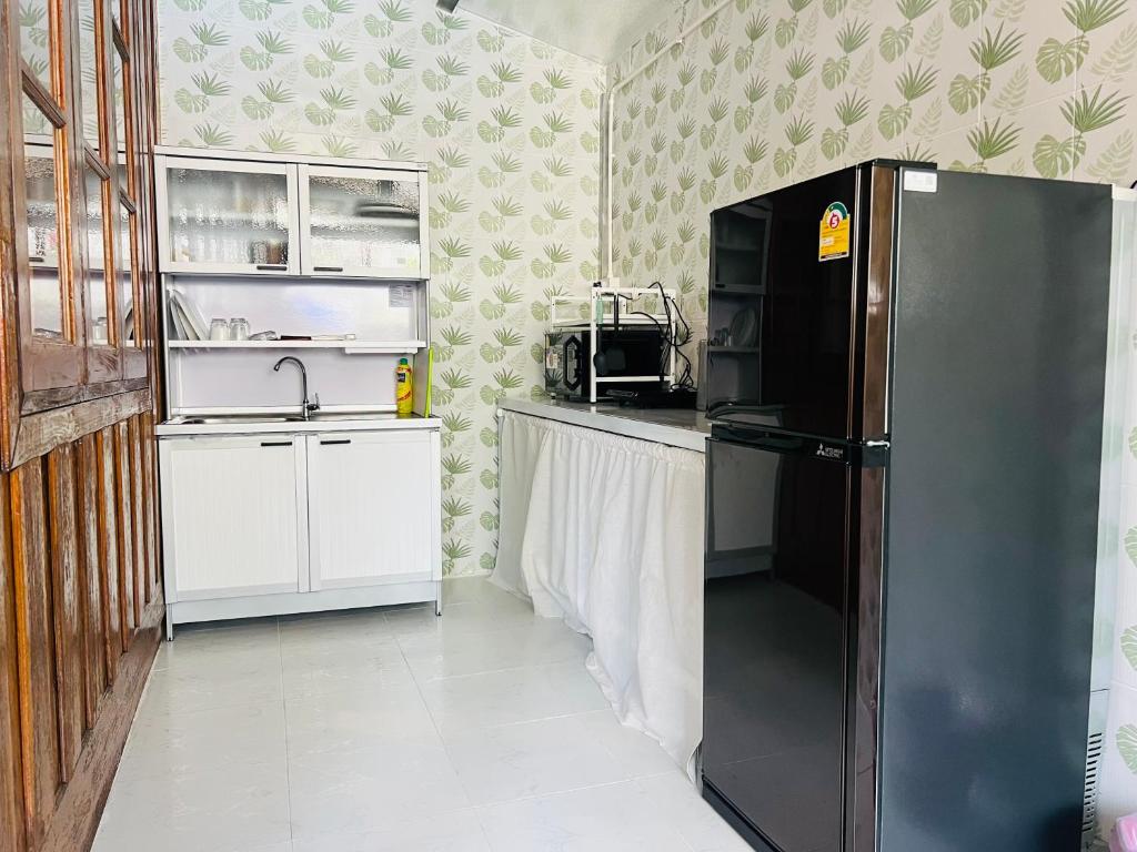 Kuchyň nebo kuchyňský kout v ubytování Tharathip Resort Koh Phangan - SHA Plus