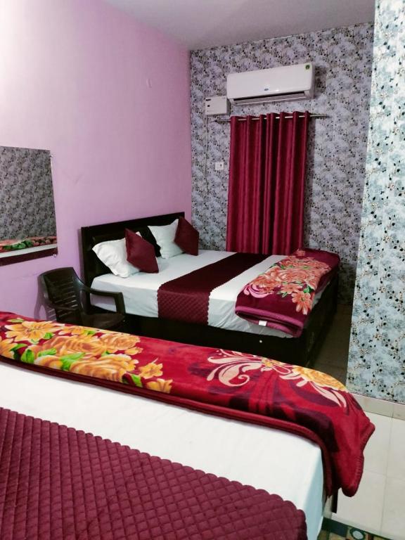 Voodi või voodid majutusasutuse Premshi Guest House toas