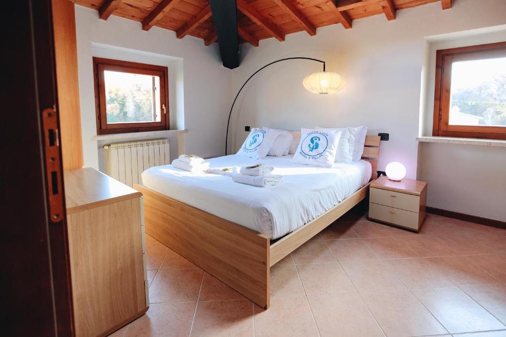 Ένα ή περισσότερα κρεβάτια σε δωμάτιο στο SG Family - Casa Moulagard