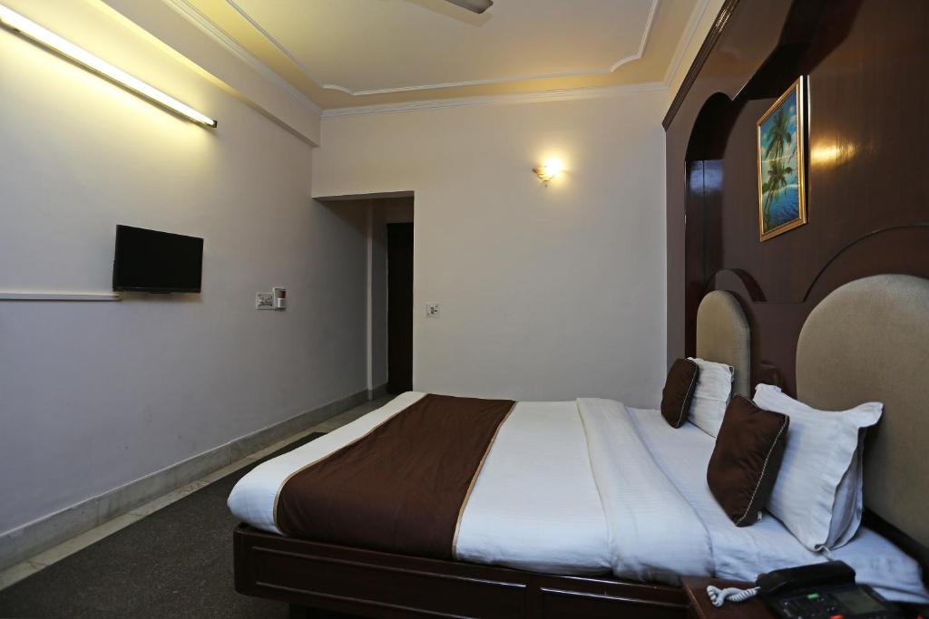TV a/nebo společenská místnost v ubytování Hotel O Gold Palace