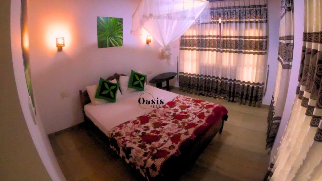 Postel nebo postele na pokoji v ubytování Oasis Ella