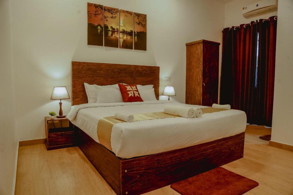 Postel nebo postele na pokoji v ubytování Lucky Transit Hotel - Katunayake Airport